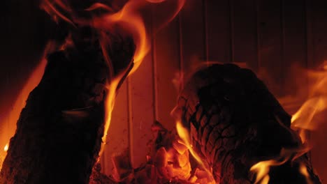 Burning-Flame-At-Fireplace-on-wooden-logs