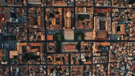 top-down view of piazza municipio and noto san nicolò cathedral surrounded by historic houses. aerial