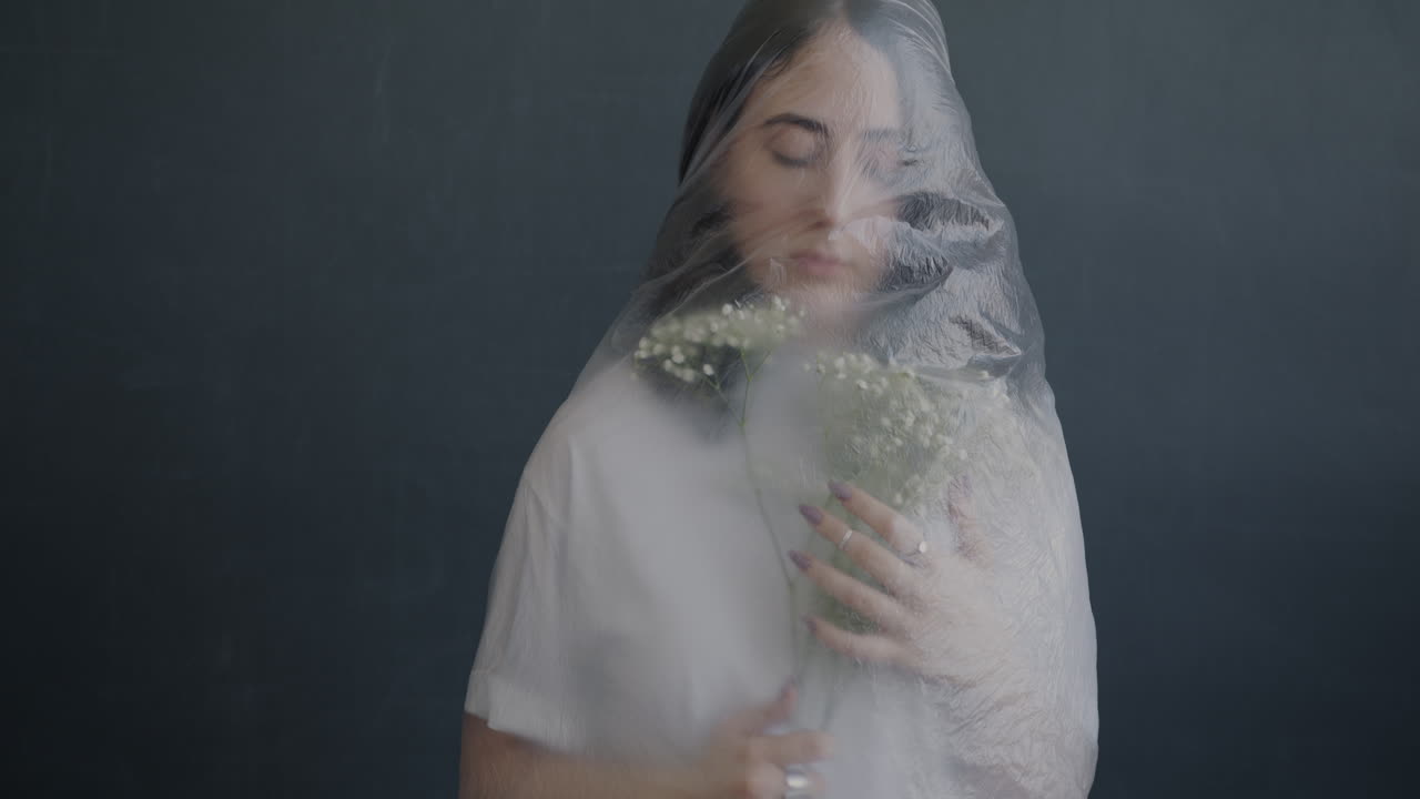 Woman Covered in Plastic with Flowers