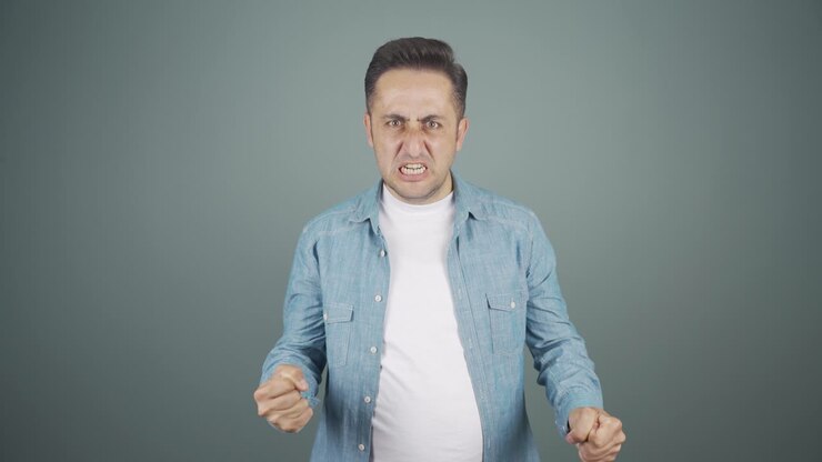 Man getting angry at camera.