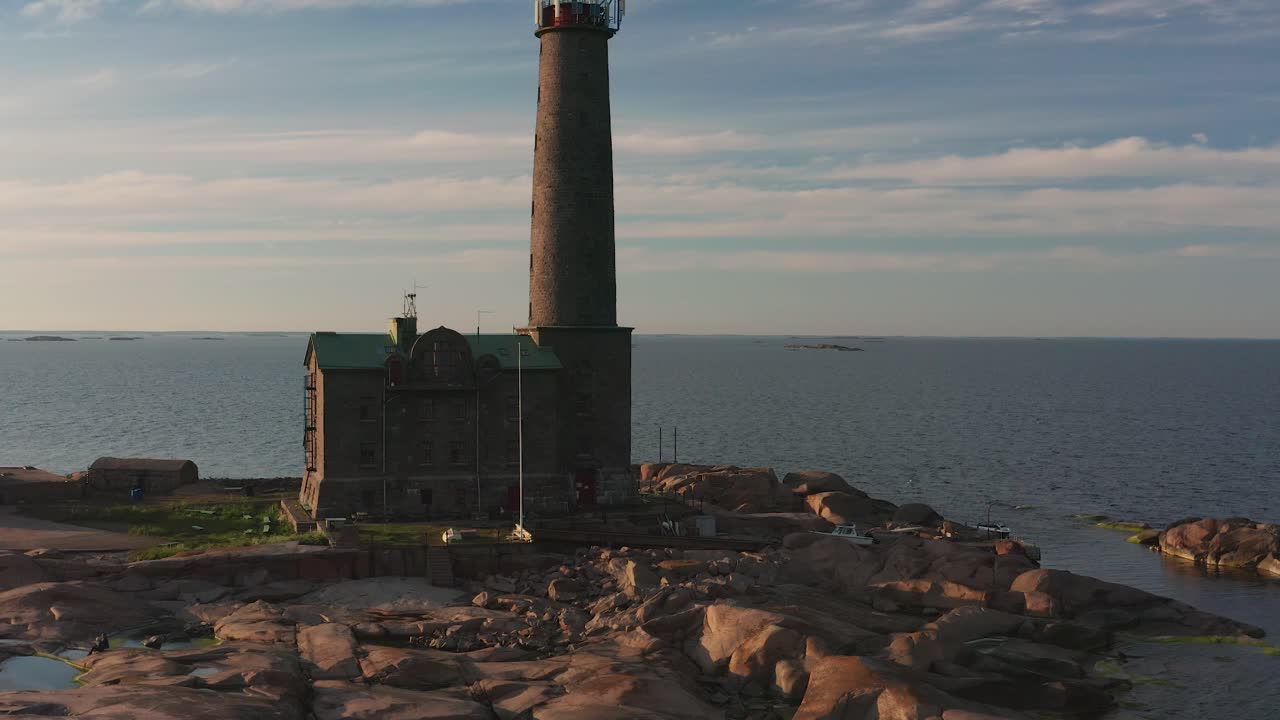 Aerial view of Bengtskär lighthouse during setting sun. The lighthouse is the tallest lighthouse in the Nordic countries and is famous for the beautiful surroundings.