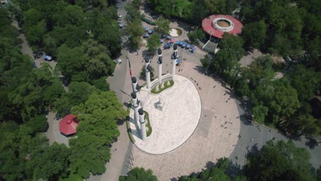 aerial view of mexico city, modern art surrounded by greenery