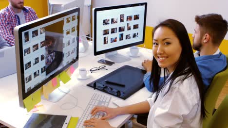 Graphic-designers-working-at-their-desk