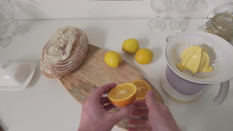 preparing juice with citrus fruits