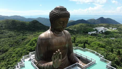 Hong-Kong-Nong-Ping-big-Buddha-and-surrounding-lush-green-environment,-Aerial-view