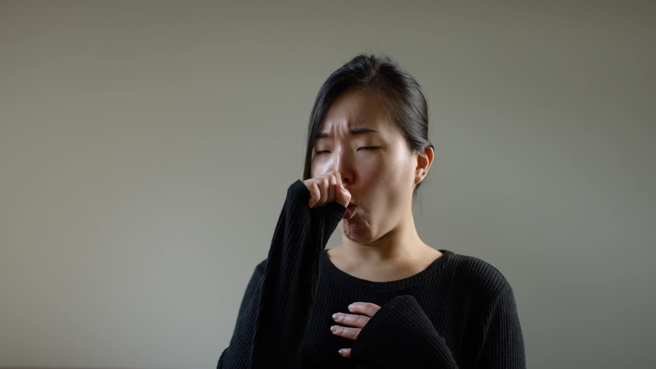 Asian Woman Coughing With Corona Virus In Slow Motion B