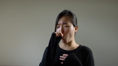 asian woman coughing with corona virus in slow motion b