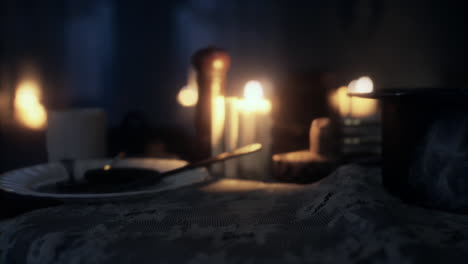 table setting in candlelight at night