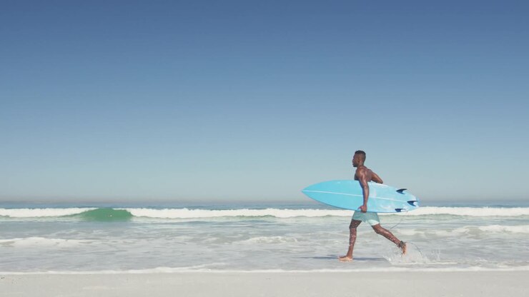 African American man ready to go surf