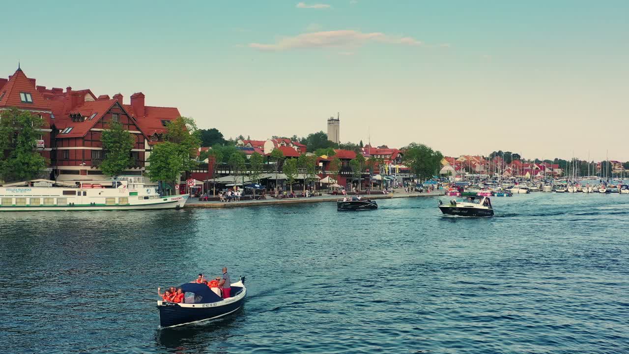 The children say hello from their holiday at the lake.