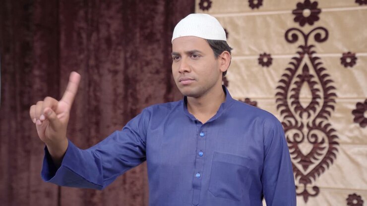 Muslim man nodding head and saying NO