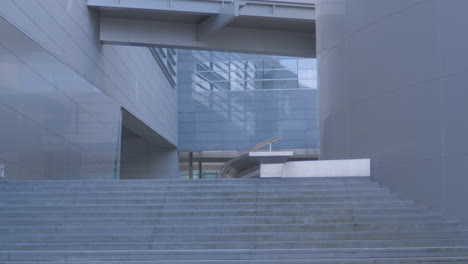 wide concrete stairs between buildings - zoom out