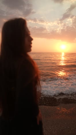 woman at the beach at sunset