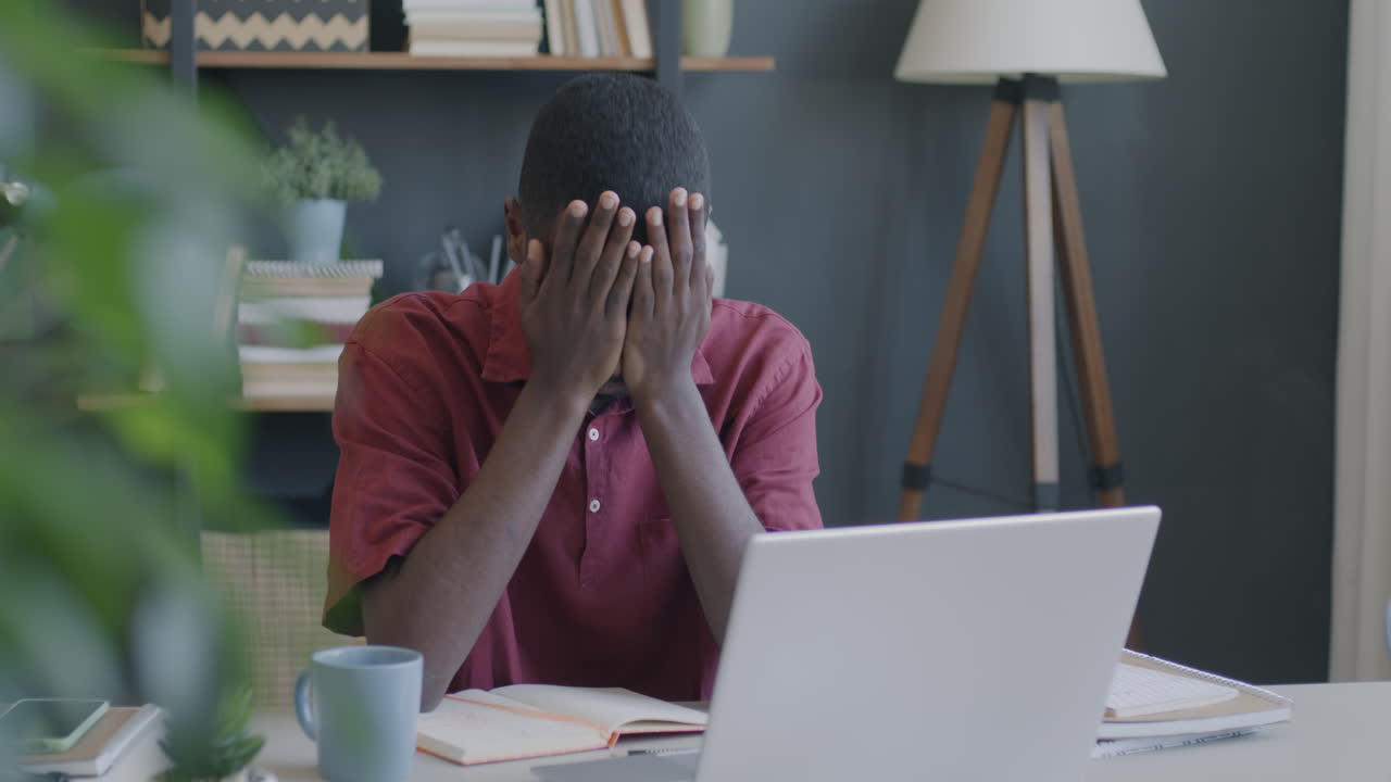 Man Working at Home or Office on Laptop