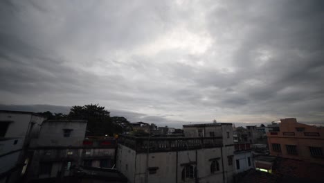 dark clouds over small town in india or asia
