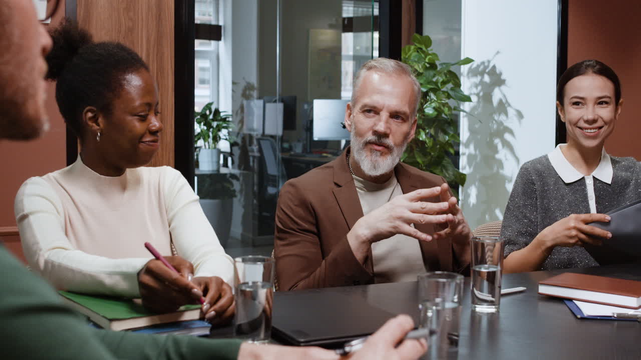 Diverse business professionals in an office meeting