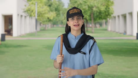 angry indian female security guard shouting on someone