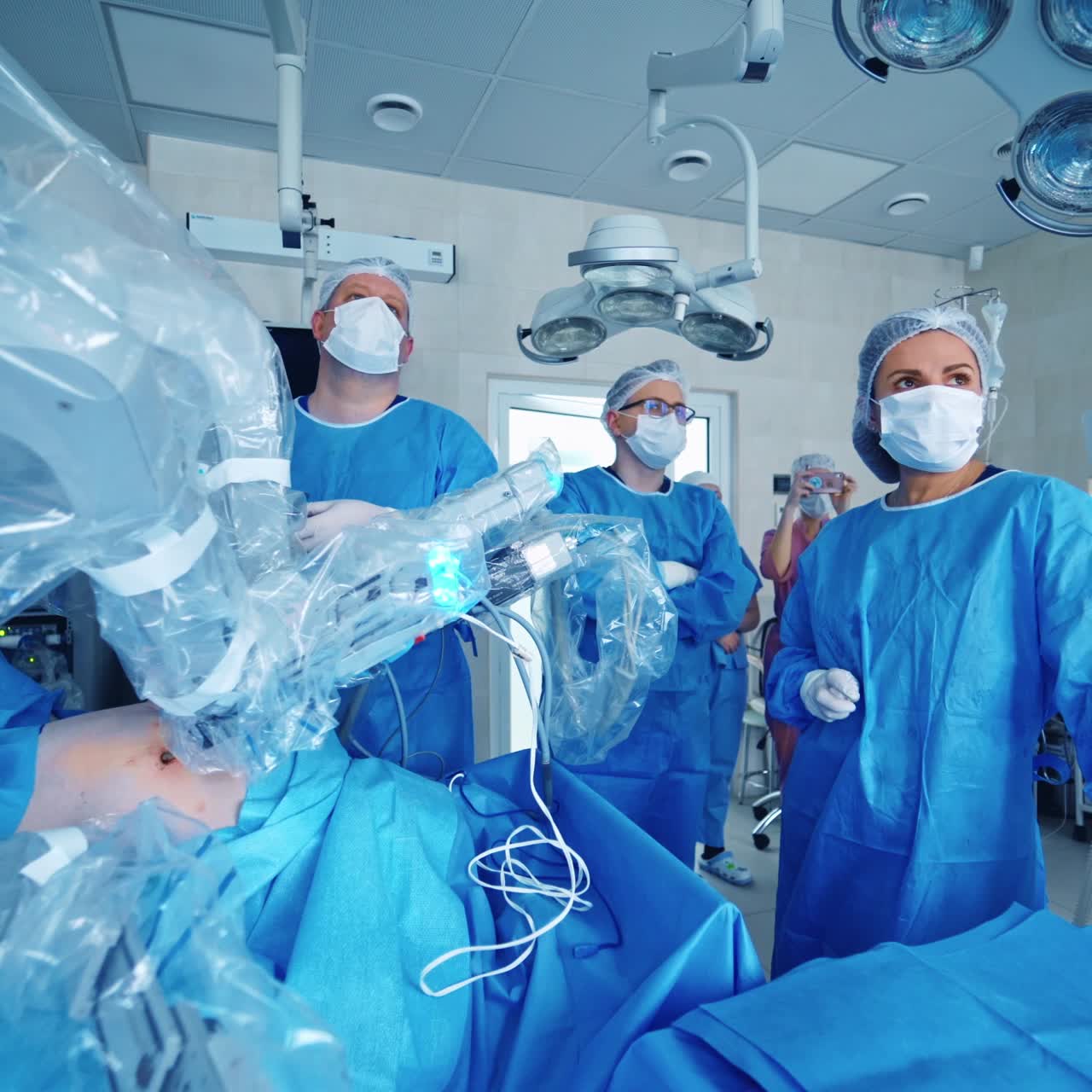 Robotic assisted minimally invasive surgery with surgical robot. Modern automated medical device.