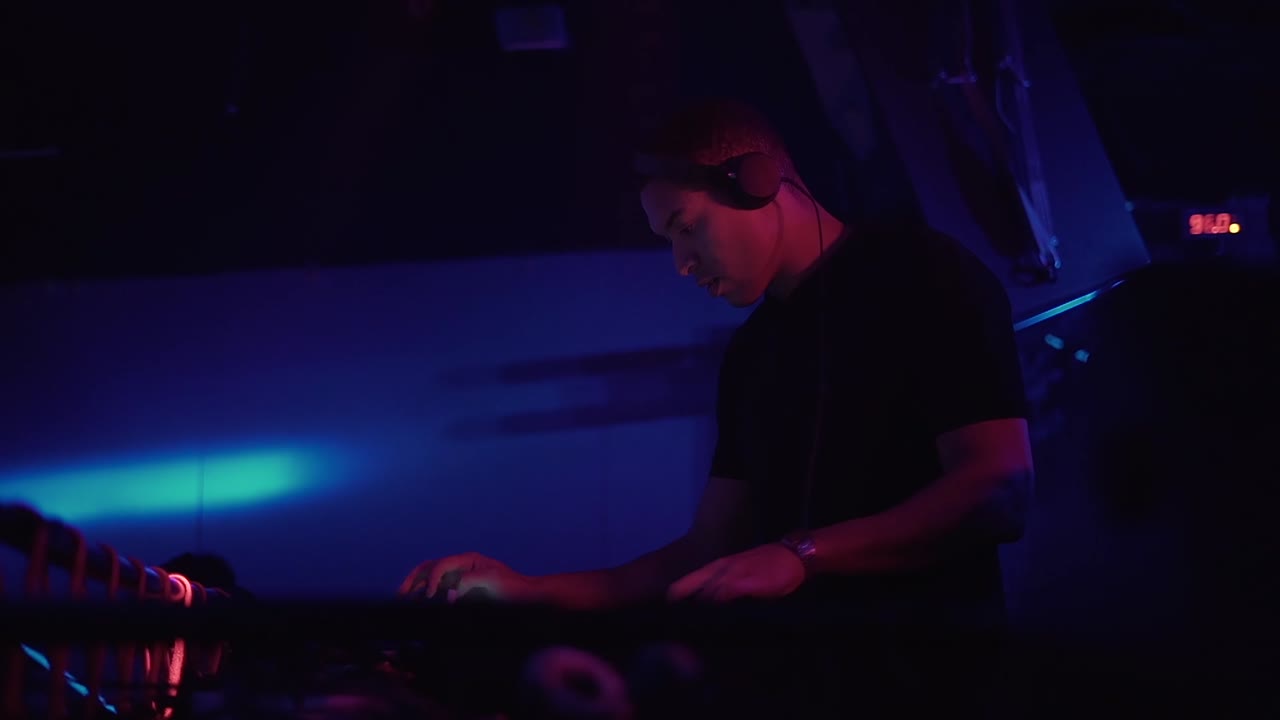 DJ performing at a nightclub