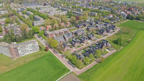 beautiful aerial of a modern suburban neighborhood with photovoltaic solar panels on rooftops