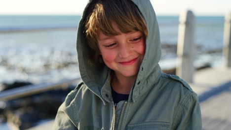 child, face and smile on beach for travel holiday