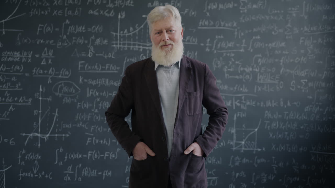 Professor in front of a chalkboard filled with mathematical equations