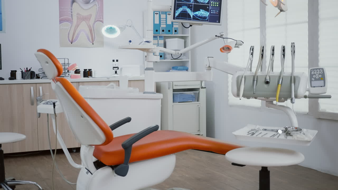 Interior of modern equipped dental orthodontic office with teeth x ray images