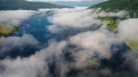 aerial footage beautiful nature norway over the clouds.