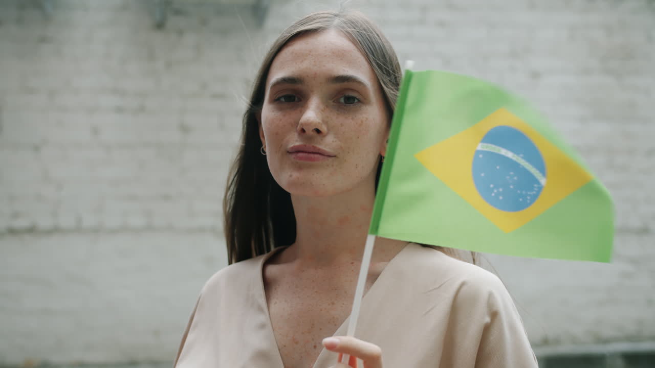 Woman Holding Brazilian Flag