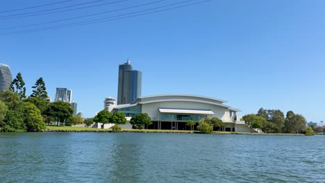 peaceful waterside scene with modern architecture