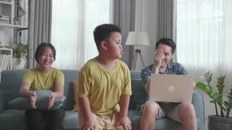 happy family dancing in living room