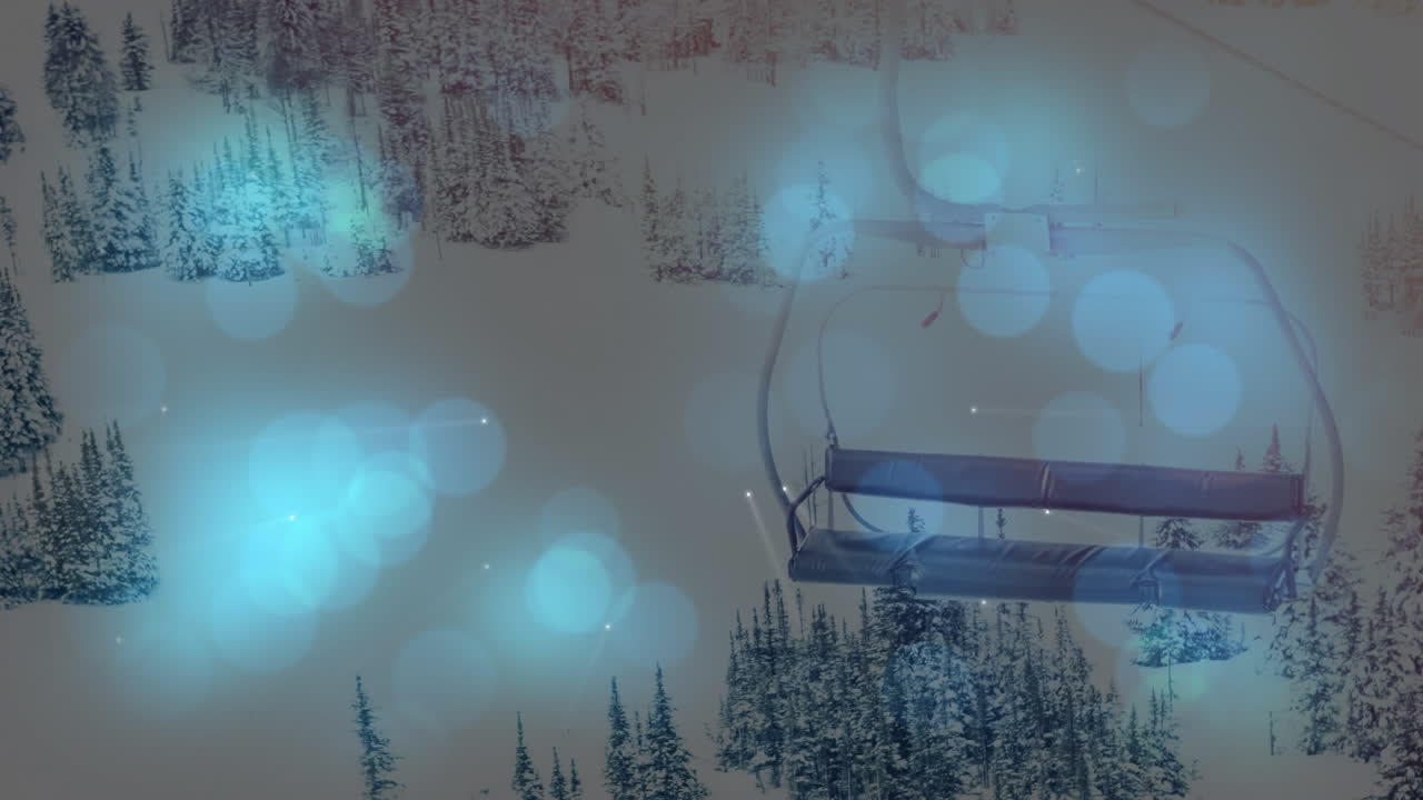 스키 의자 엘리베이터와 겨울 풍경 위의 빛의 반점의 애니메이션