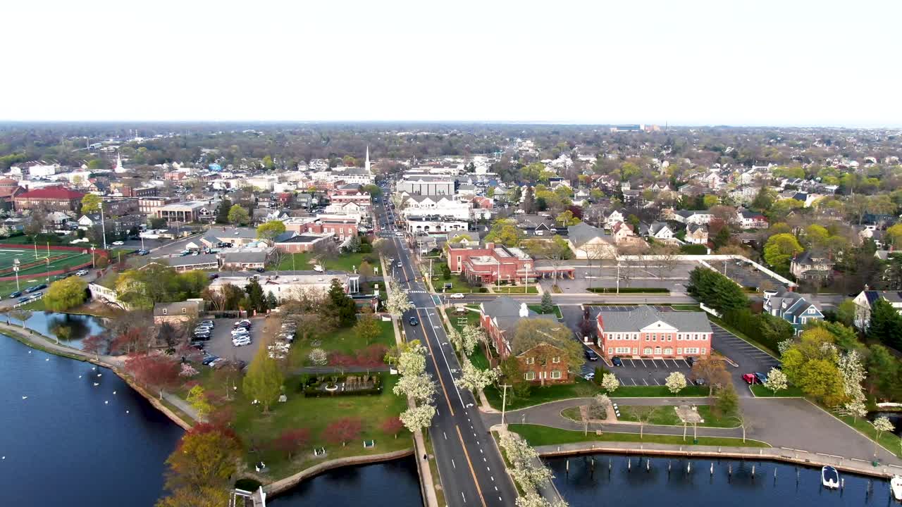 Aerial over Babylon, New York, panning from Great South Bay to Argyle Lake Park