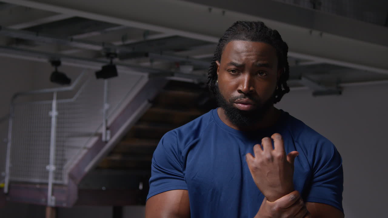 Male Athlete Or Boxer Training In Gym Sparring And Warming Up Preparing For Sports Event Or Fight