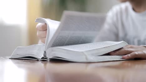 praying-to-god-with-bible-on-white-background-with-people-stock-video-stock-footage