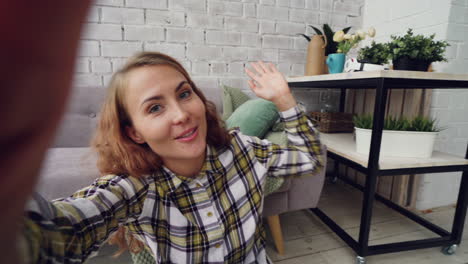 woman doing a video call from home