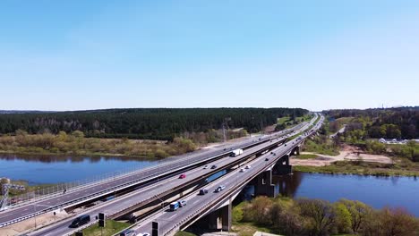 freshly built highway bridge over river neris in kaunas, aerial ascend view