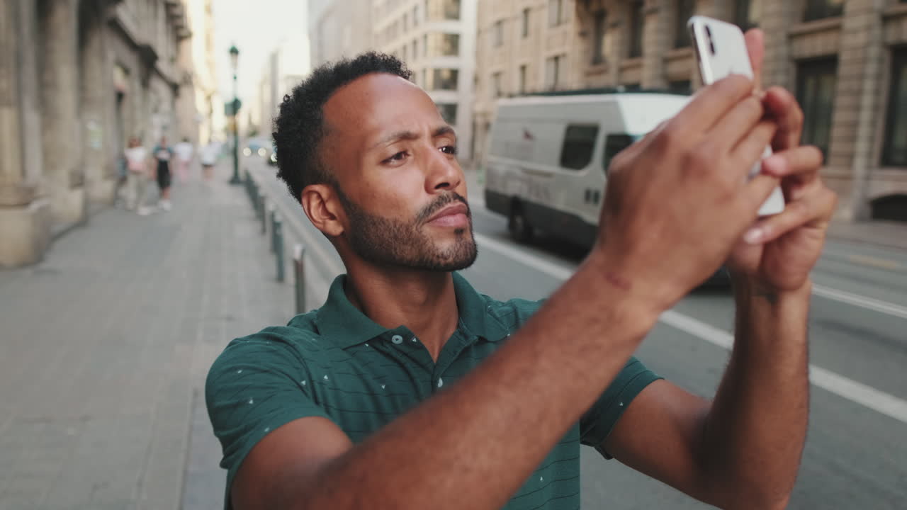 Man taking photos in the city