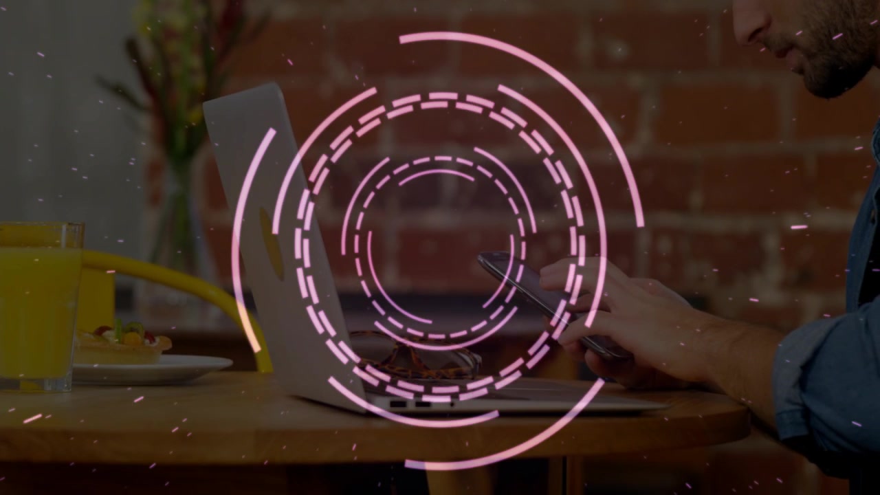 Man placing hands on keyboard, typing, tapping phone, pink HUD rotating over laptop for remote work