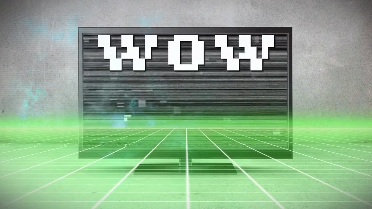 Animatie van interferentie over computermonitor met 'wow'-tekst.