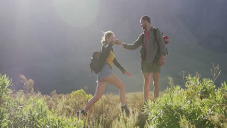 caucasian couple hiking in nature