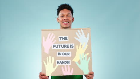 volunteer man, protest sign and studio with smile