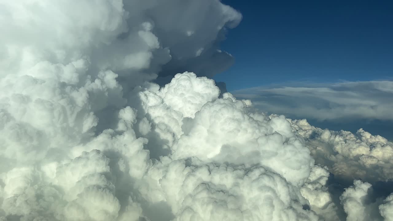 Stunning pilot&rsquo;s perspective of a massive cumulonimbus storm cloud while flying close to it