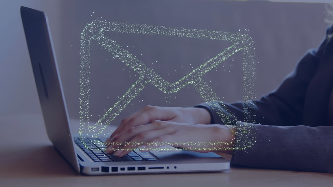 woman typing on laptop keyboard in business workspace, showcasing holographic digital envelope icon