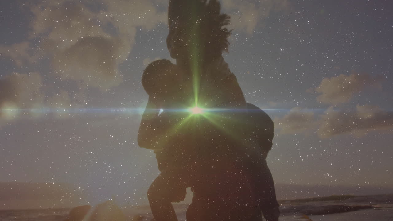 Embracing under starry sky, silhouetted couple with bright light effect