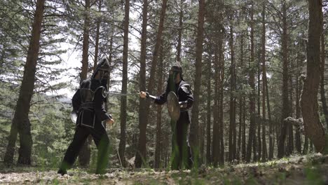 two soldiers undergoing combat training in the jungle.