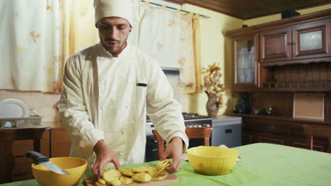 chef preparing potatoes