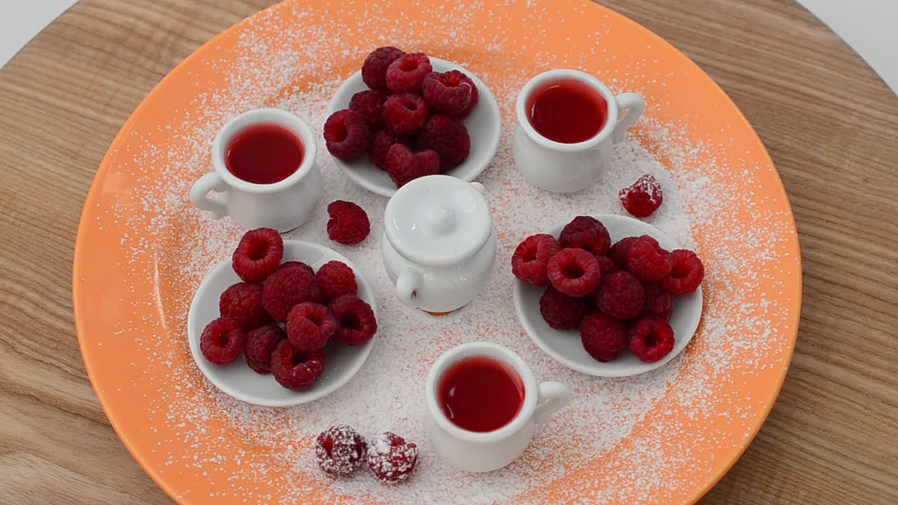 Rotation shot of Raspberry and jam, still life. Shooting in the movement