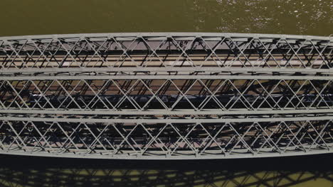 Bird's-eye-view-of-train-crossing-Hohenzollern-Bridge,-Cologne-Germany