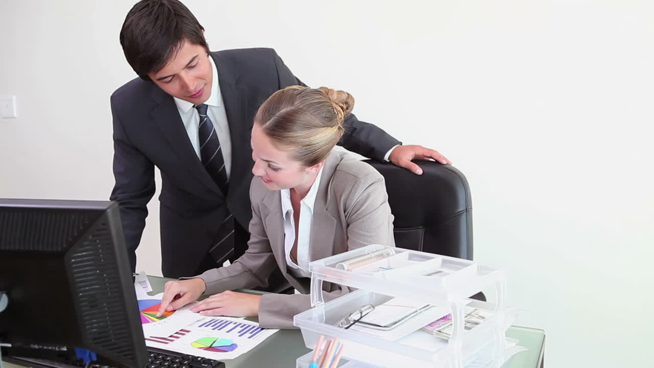 Workers talking about statistics